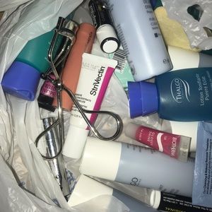 Huge bag of creams, makeup and cleansing products